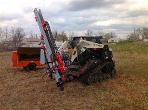 drilling piers with skid steer|skid steer attachments.